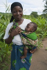 Woman carrying child    
